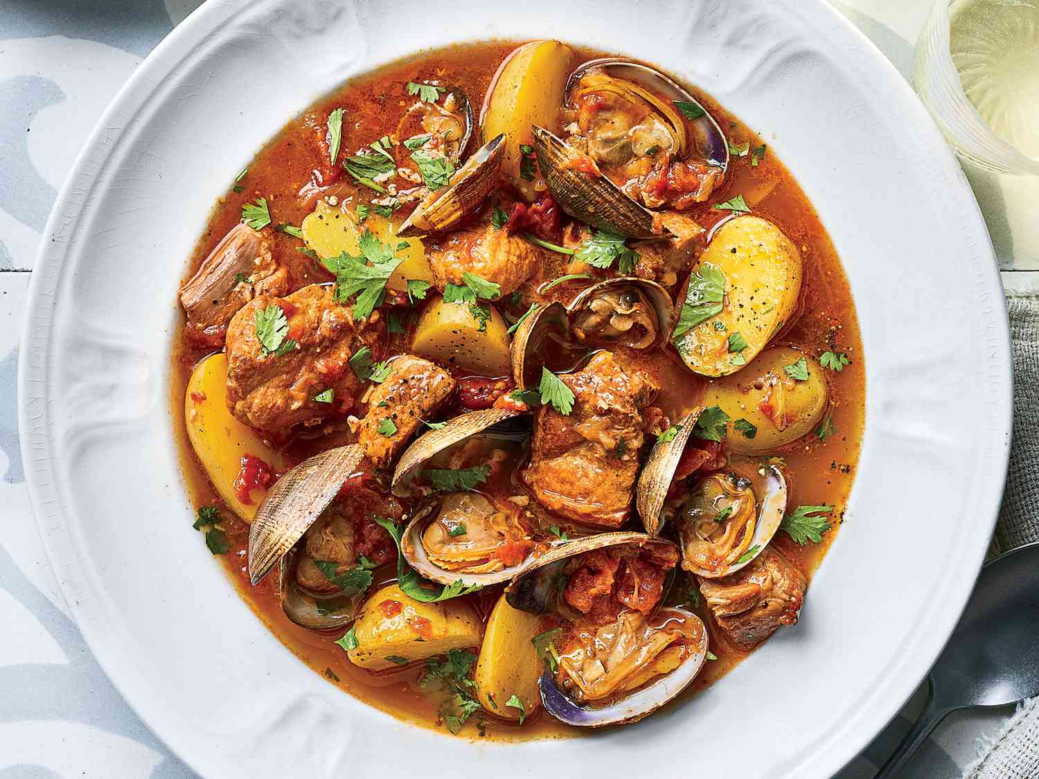 portugese-braised-pork-and-clams-FT-RECIPE0919-e06ec9aee6c3408cbc7318a4ea771d18
